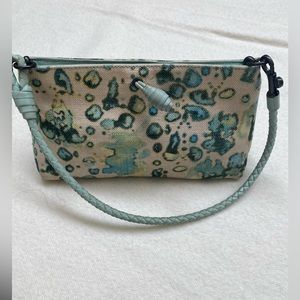 Bottega Venetta clutch with detachable shoulder strap. Splash color concept